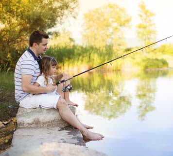 Daddy and daughter fishing