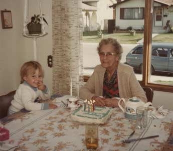 Grandma, grand-daughter, tea and cake