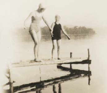 Family swimming at the lake